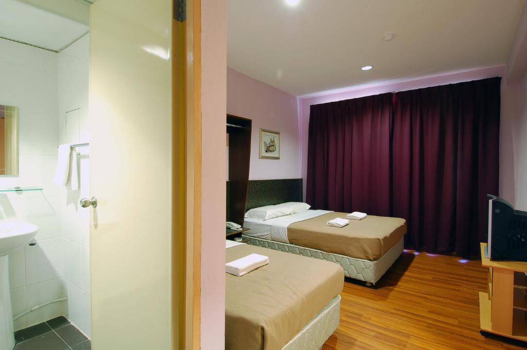 Aristo Hotel Putatan Kota Kinabalu Szoba fotó